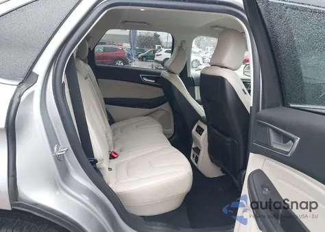 2021 Ford Edge Titanium z USA, uszkodzony, nr VIN 2FMPK4K9XMBA53607